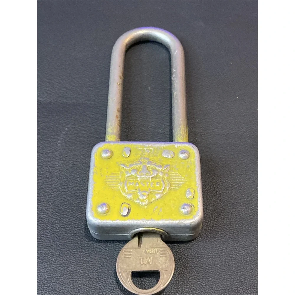 Vintage MASTER LOCK Padlock Lion Face Long Shackle 77 Works w/ Key Yellowish Clr